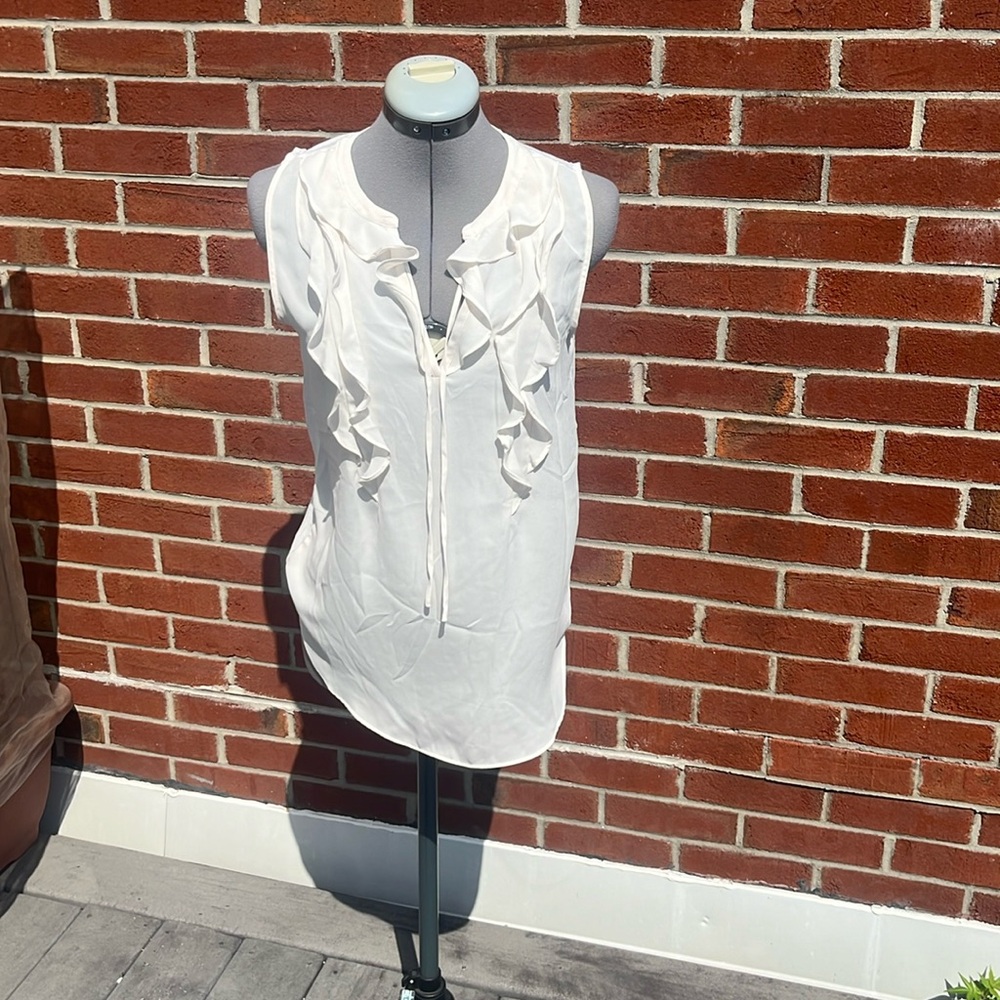Cream ruffled top